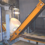 Turning device for paper rolls with Rolleri roll handling covers. Metsä Tissue Oyj, Mänttä