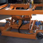 Roll transfer car with lifting mechanism.